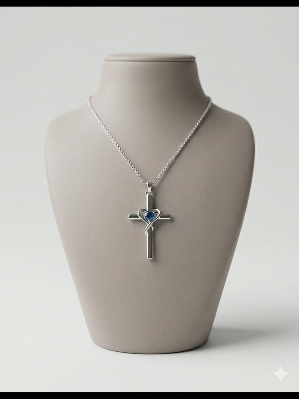 Silver Cross Pendant Necklace with Blue Heart Gem